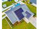Aerial view of home showcasing pool, hot tub, landscaping, and solar panels on the roof at 601 Seth Ln., Longs, SC 29568