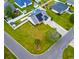 Aerial view of home showcasing the well-manicured lawn, and solar panels on the roof at 601 Seth Ln., Longs, SC 29568