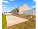 A large backyard stone patio with a retaining wall, great for entertaining at 601 Seth Ln., Longs, SC 29568