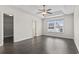 Empty main bedroom featuring ample natural light and neutral color palette at 601 Seth Ln., Longs, SC 29568