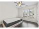 A bedroom featuring a mattress, wood flooring, a ceiling fan, and plenty of natural light at 601 Seth Ln., Longs, SC 29568