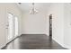 A dining room with dark flooring and light colored walls at 601 Seth Ln., Longs, SC 29568