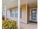 Inviting front porch with decorative pillars and well-maintained landscaping at 601 Seth Ln., Longs, SC 29568