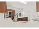 Open concept kitchen featuring a breakfast bar, granite countertops, and stainless steel appliances at 601 Seth Ln., Longs, SC 29568