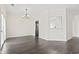 A spacious living room with a view to the stainless steel kitchen appliances at 601 Seth Ln., Longs, SC 29568