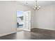 The living room features an open back door view of the pool and backyard at 601 Seth Ln., Longs, SC 29568