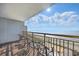A sunny ocean view from the condo balcony with chairs at 7200 N Ocean Blvd. # 1053, Myrtle Beach, SC 29572