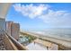 Balcony with ocean, beach, and pool views at 7200 N Ocean Blvd. # 1053, Myrtle Beach, SC 29572