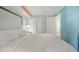 Comfortable king-sized bed in bedroom with a side door and an ensuite at 7200 N Ocean Blvd. # 1053, Myrtle Beach, SC 29572