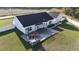 Aerial view of the house showcasing the backyard, privacy screen and manicured lawn at 7473 Louisville Rd., Aynor, SC 29511