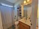 Functional bathroom with a shower-tub combo, toilet, and single sink offers practical amenities at 7473 Louisville Rd., Aynor, SC 29511