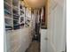 Walk-in closet boasts built-in shelving and ample storage space at 7473 Louisville Rd., Aynor, SC 29511
