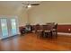 Charming dining room features an access door and hardwood floors at 7473 Louisville Rd., Aynor, SC 29511