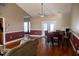 Spacious dining area with hardwood flooring and a view of the backyard at 7473 Louisville Rd., Aynor, SC 29511