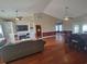 Open-concept living room with hardwood floors and abundant natural light at 7473 Louisville Rd., Aynor, SC 29511