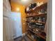 Walk-in pantry with extensive shelving for storage at 7473 Louisville Rd., Aynor, SC 29511