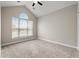 Bedroom featuring neutral paint, a ceiling fan, and a window overlooking the outdoors at 826 Sand Binder Dr., Myrtle Beach, SC 29579