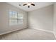 Bedroom featuring neutral paint, carpeted floors, and a window overlooking the outdoors at 826 Sand Binder Dr., Myrtle Beach, SC 29579