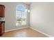 The breakfast nook has tile floors, neutral paint, and a view to the outdoors at 826 Sand Binder Dr., Myrtle Beach, SC 29579