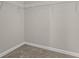 Walk-in closet featuring carpet flooring and custom shelving at 826 Sand Binder Dr., Myrtle Beach, SC 29579