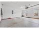 Garage with sealed concrete floor, water heater, and garage door opener at 826 Sand Binder Dr., Myrtle Beach, SC 29579