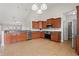Features stainless steel appliances, wooden cabinets and tile floors at 826 Sand Binder Dr., Myrtle Beach, SC 29579