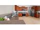 Features stainless steel appliances, wooden cabinets and tile backsplash at 826 Sand Binder Dr., Myrtle Beach, SC 29579