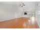 Open-concept living room featuring hardwood floors, a ceiling fan, recessed lighting, and an open layout at 826 Sand Binder Dr., Myrtle Beach, SC 29579