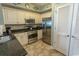 Bright kitchen featuring stainless steel appliances, granite countertops and tile flooring at 100 North Beach Blvd. # 1704, North Myrtle Beach, SC 29582