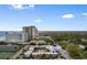 An aerial view of a well-situated complex near the beach and lush green spaces at 10100 Lakeshore Dr. # C-1, Myrtle Beach, SC 29572