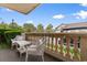 Relaxing balcony area with comfortable wicker furniture, providing a peaceful outdoor space with views at 10100 Lakeshore Dr. # C-1, Myrtle Beach, SC 29572
