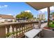 Charming balcony with outdoor seating, a view of the neighborhood, and a golf cart parked nearby at 10100 Lakeshore Dr. # C-1, Myrtle Beach, SC 29572