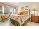 Bright bedroom with comfortable bedding, great natural light and coastal decor at 10100 Lakeshore Dr. # C-1, Myrtle Beach, SC 29572
