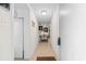 Bright hallway with a round, decorative table and a tiled floor at 10100 Lakeshore Dr. # C-1, Myrtle Beach, SC 29572