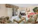Spacious living room with access to patio and comfortable seating, perfect for relaxing at 10100 Lakeshore Dr. # C-1, Myrtle Beach, SC 29572