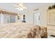 Comfortable main bedroom featuring a decorative ceiling fan and tile floors at 10100 Lakeshore Dr. # C-1, Myrtle Beach, SC 29572