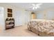 Bright main bedroom with comfortable bedding, lots of closet space and tile floors at 10100 Lakeshore Dr. # C-1, Myrtle Beach, SC 29572
