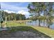 Beautiful backyard with a serene lake view, perfect for relaxation and outdoor activities at 105 Windsor Springs Rd., Conway, SC 29526