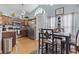 Cozy kitchen and dining area with modern appliances, rich cabinetry, and a bright, inviting atmosphere at 105 Windsor Springs Rd., Conway, SC 29526