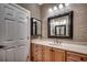 The bathroom features a large mirror, vanity with drawers, sink and modern lighting at 109 Pheasant Run Dr., Murrells Inlet, SC 29576
