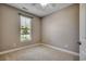 Neutral bedroom with a carpet floor, ceiling fan, and window with blinds at 109 Pheasant Run Dr., Murrells Inlet, SC 29576