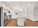 Well-lit kitchen featuring stainless steel appliances and a center island with pendant lighting at 1095 Nw Forest Bend Dr., Calabash, NC 28467