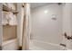 Compact bathroom featuring a tub-shower combo and white walls at 1105 S Ocean Blvd. # 502, Myrtle Beach, SC 29577