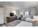 Comfortable bedroom showcasing two beds, a dresser, and a cozy atmosphere at 1105 S Ocean Blvd. # 502, Myrtle Beach, SC 29577