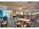 Comfortable seating and tables surround the bowling alley, providing a space to socialize at 1105 S Ocean Blvd. # 502, Myrtle Beach, SC 29577