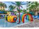 Resort-style pool area for featuring a colorful submarine water feature and rainbow sprinklers at 1105 S Ocean Blvd. # 502, Myrtle Beach, SC 29577