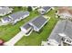 Aerial view of a home with a well-kept lawn and neighborhood, showcasing its location at 1130 Ganton Way, Myrtle Beach, SC 29588