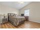 Cozy bedroom features neutral tones, a ceiling fan, and a window offering natural light at 1130 Ganton Way, Myrtle Beach, SC 29588