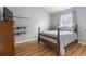 Bright bedroom with neutral paint, window and a classic wood bedframe at 1130 Ganton Way, Myrtle Beach, SC 29588