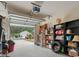 A well-organized garage with open door, shelves, and visible storage space at 1130 Ganton Way, Myrtle Beach, SC 29588